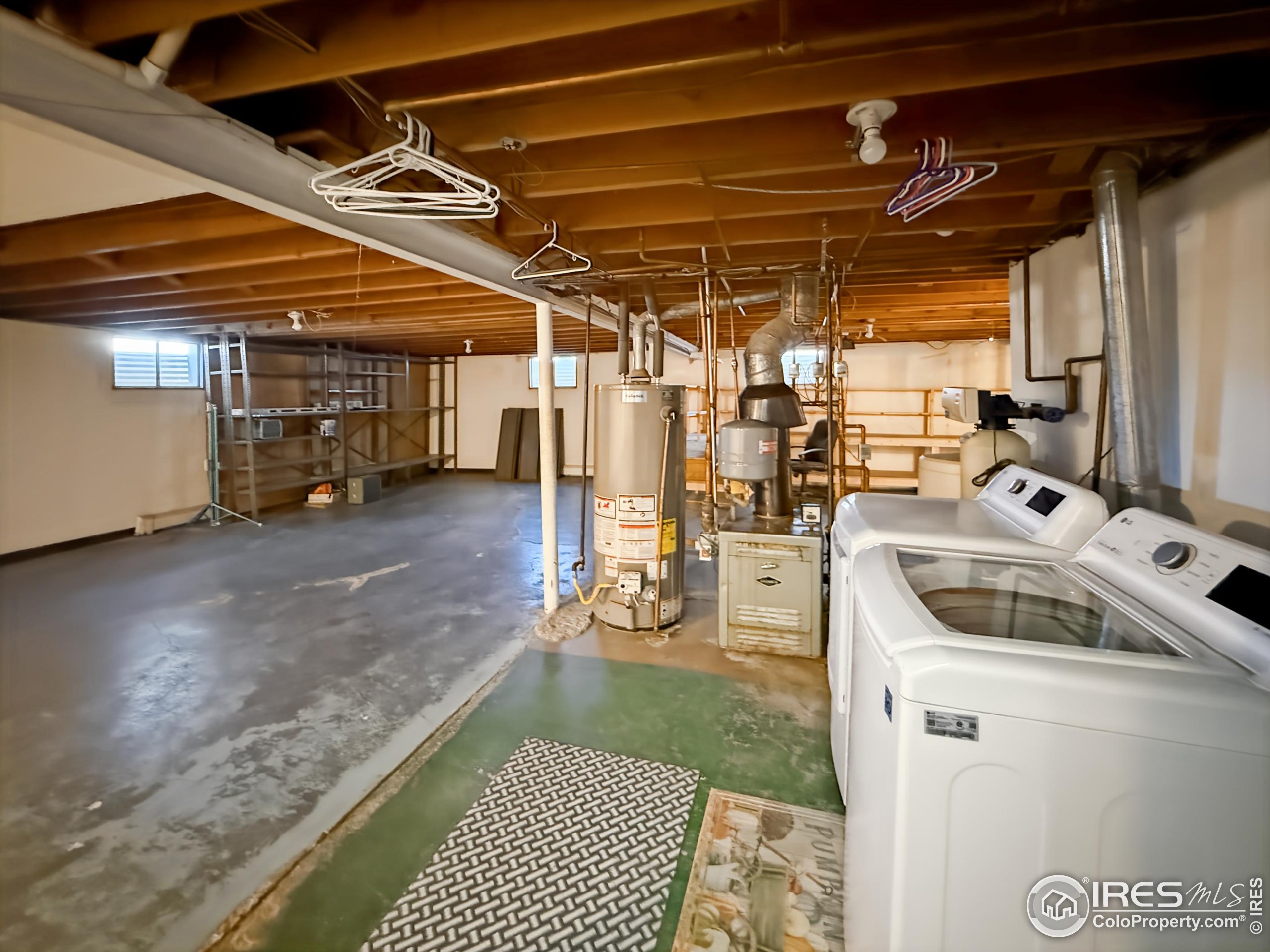 1695 6th Street Limon, CO 80828 - Photo 22 of 32 a utility room with dryer and washer