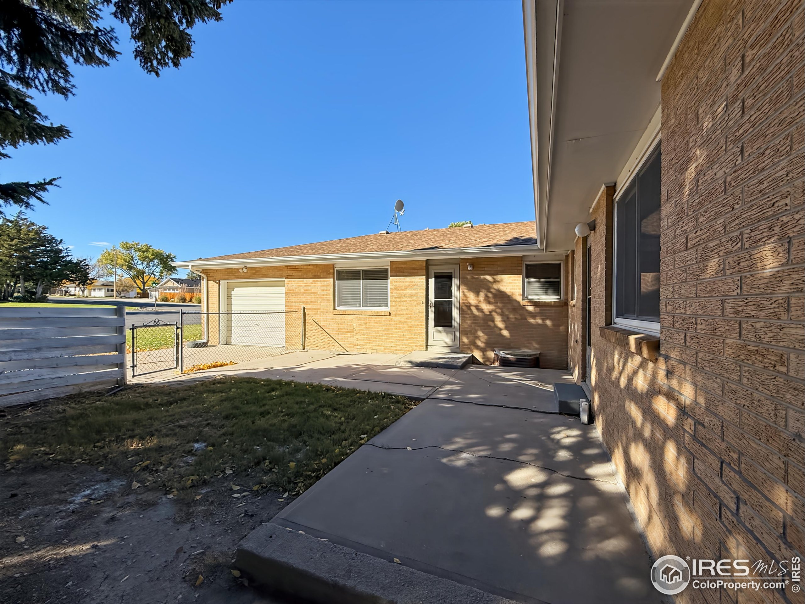1695 6th Street Limon, CO 80828 - Photo 27 of 32 a view of a house with backyard and sitting area