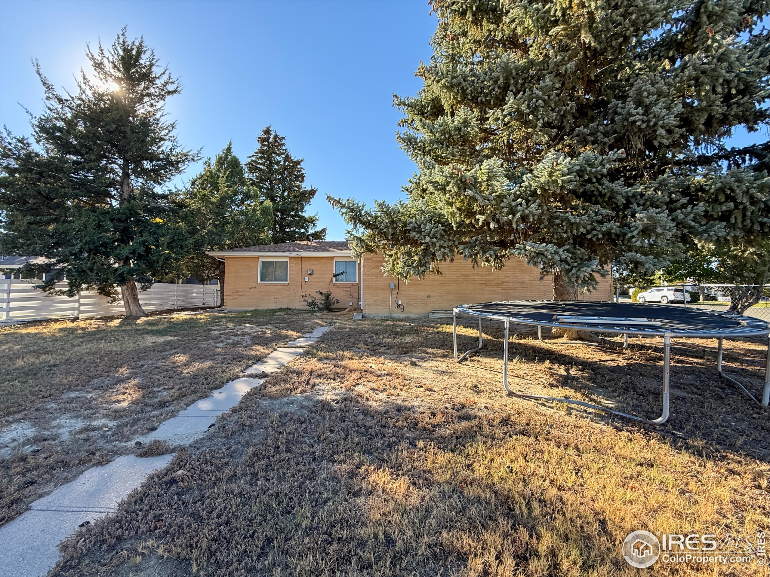 1695 6th Street Limon, CO 80828 - Photo 30 of 32 a view of a house with yard and sitting area