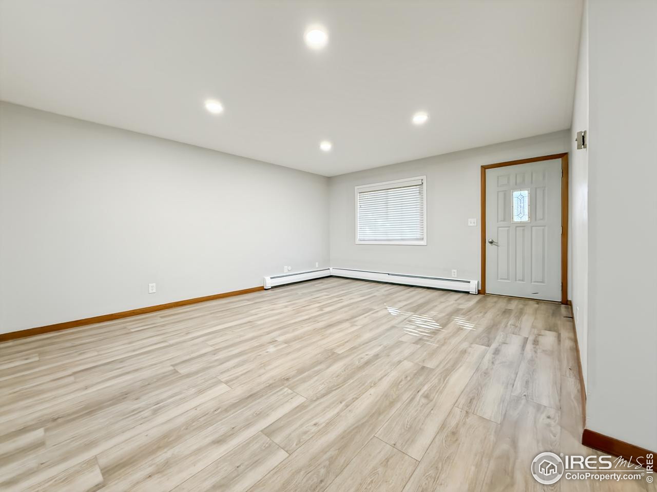 1695 6th Street Limon, CO 80828 - Photo 9 of 32 a view of empty room with wooden floor