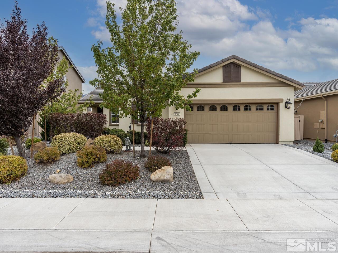 a front view of a house with entertaining space