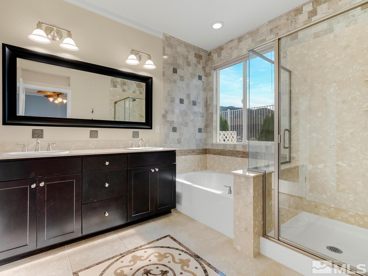 2080 Whitecliff Drive Reno, NV 89521 - Photo 11 of 21 a bathroom with double vanity and a shower