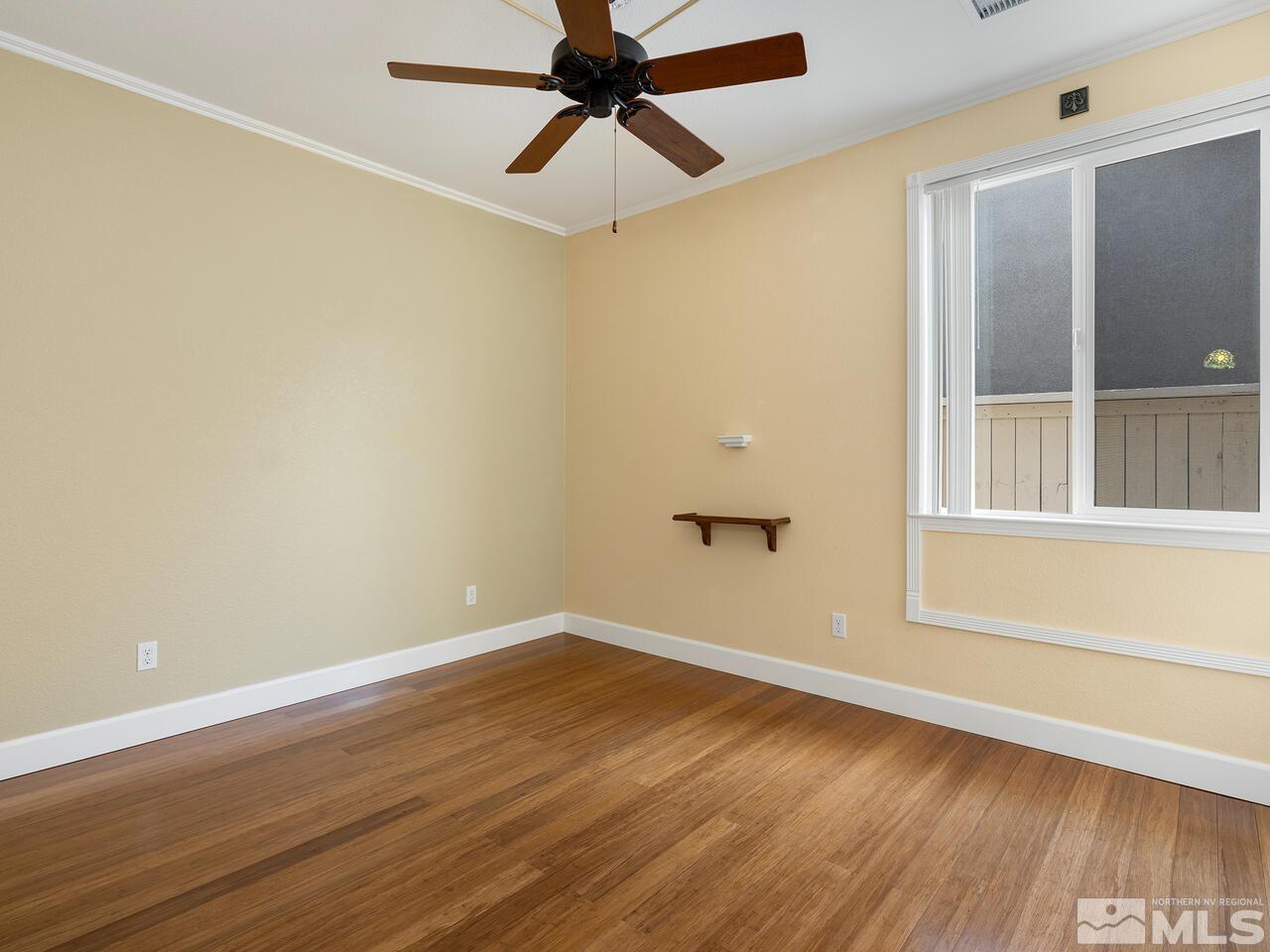 2080 Whitecliff Drive Reno, NV 89521 - Photo 15 of 21 a view of a room with wooden floor and cabinet