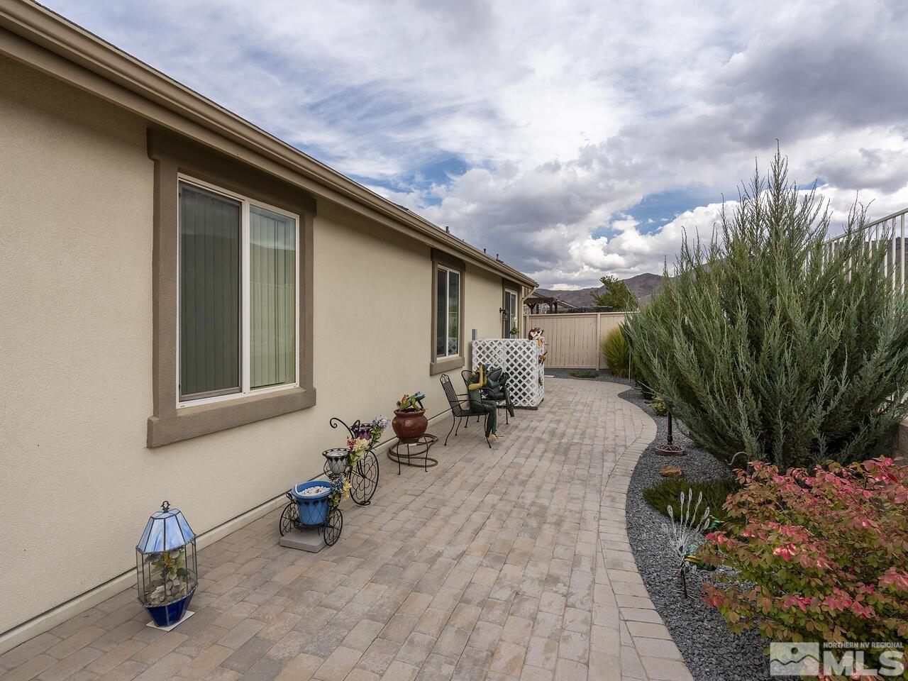 2080 Whitecliff Drive Reno, NV 89521 - Photo 18 of 21 a view of a backyard with sitting area and garden