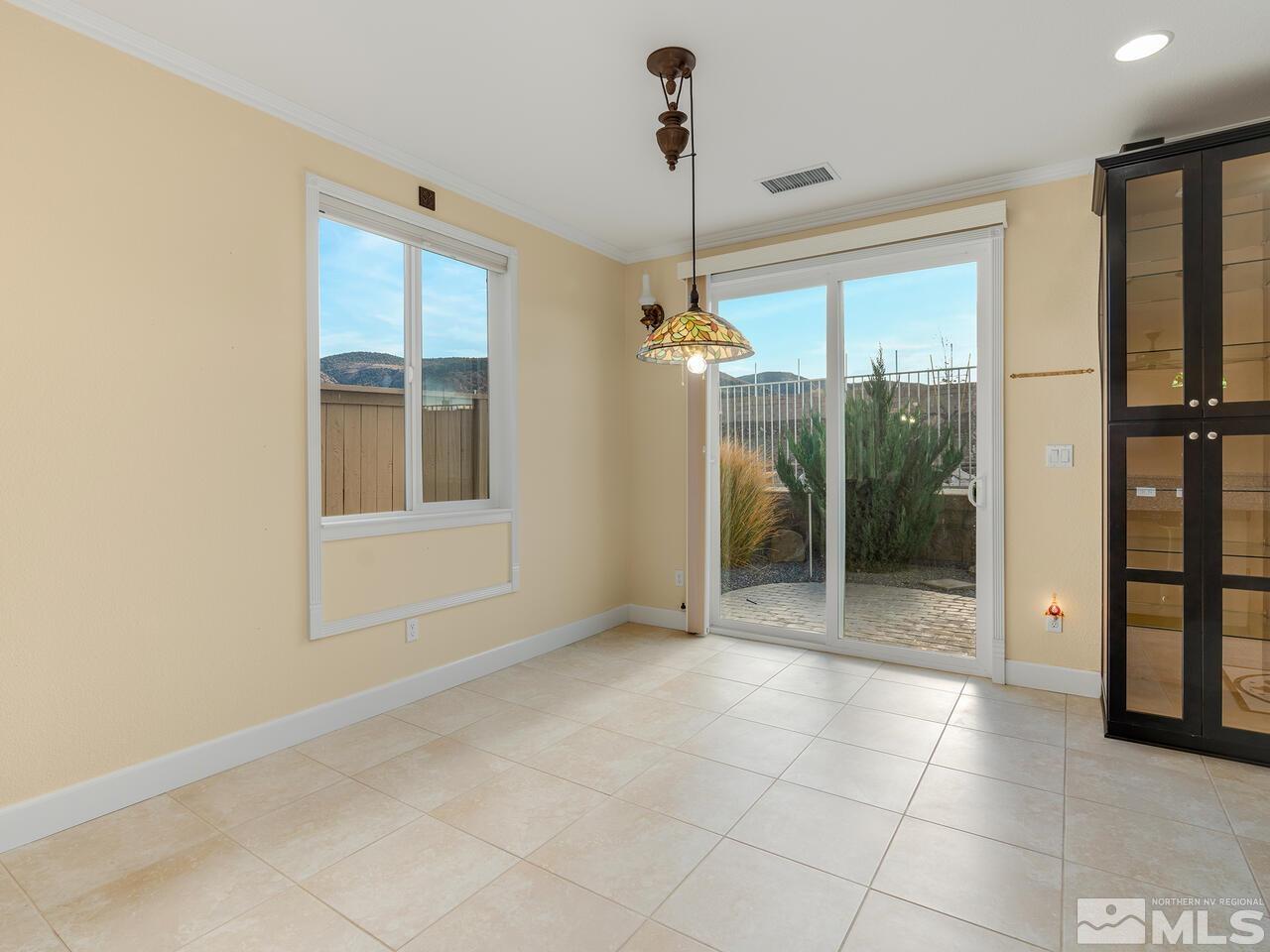 2080 Whitecliff Drive Reno, NV 89521 - Photo 9 of 21 a view of an empty room with glass door