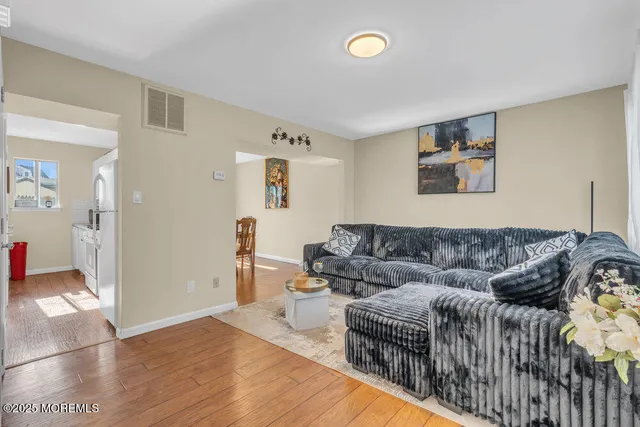 a living room with furniture and a couch