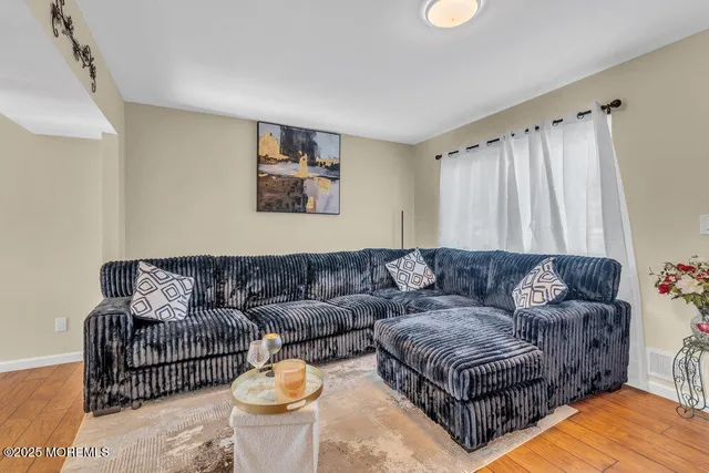 a view of a hallway with closet and entryway