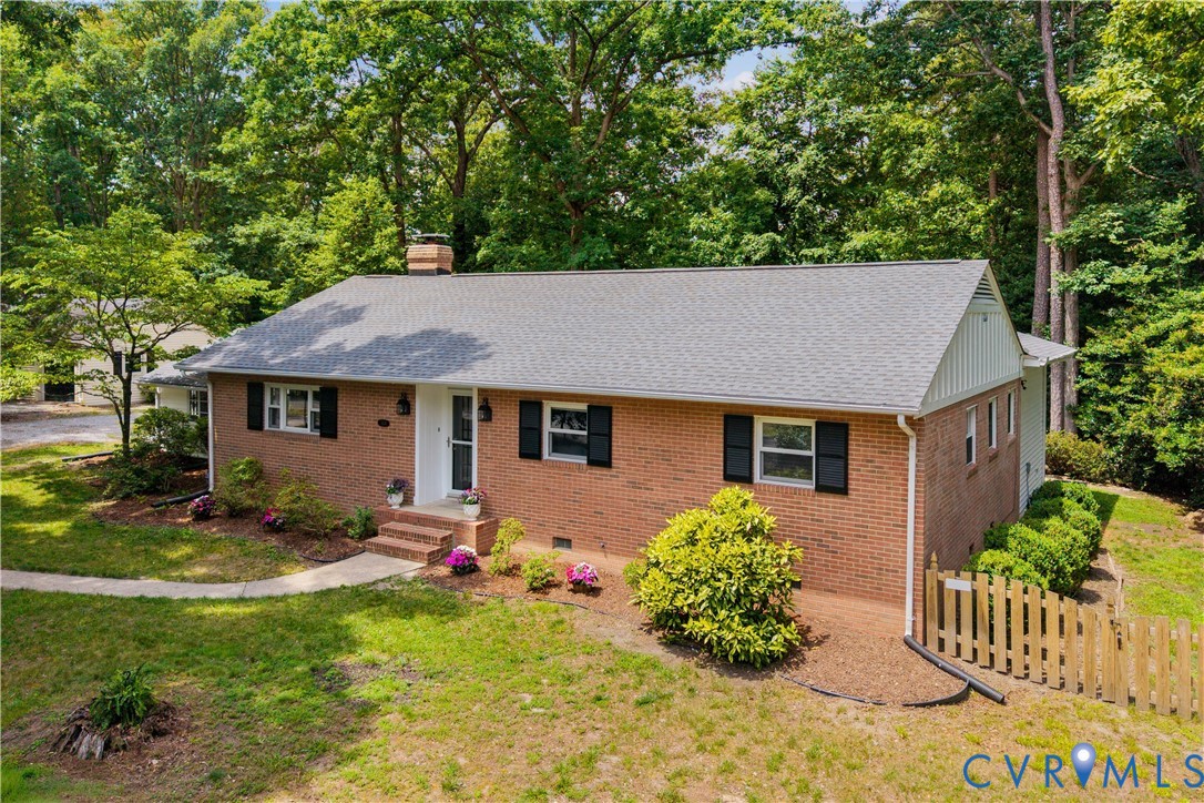 3136 Old Quarry Road Richmond, VA 23225 - Photo 5 of 39 Brick exterior residence featuring a gray shingle