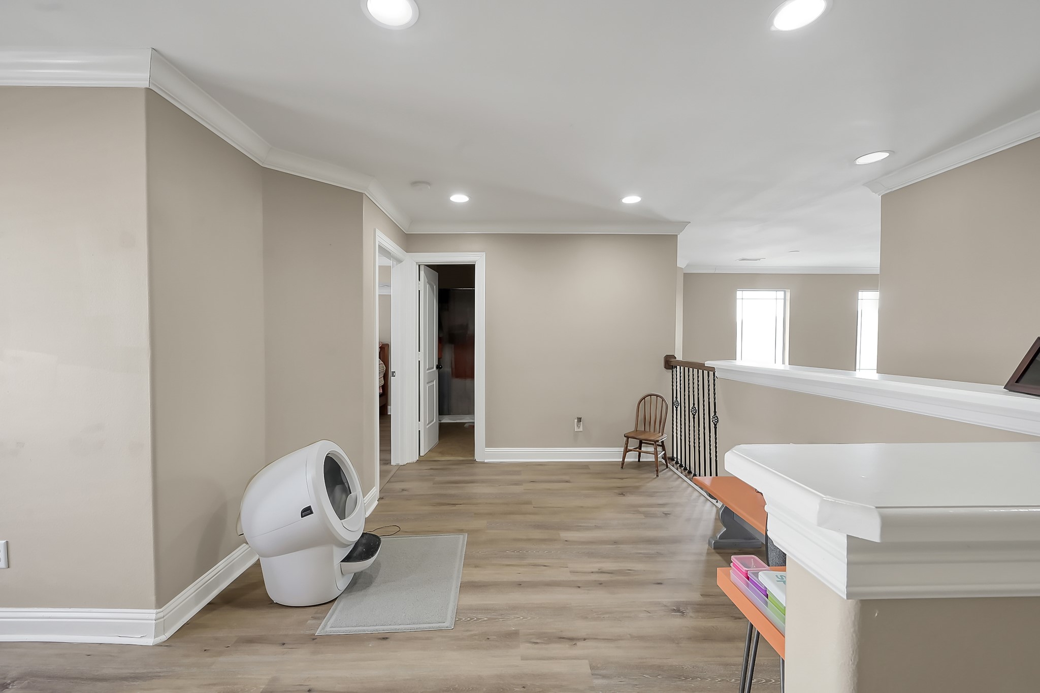 113 Capetown Way Montgomery, TX 77356 - Photo 20 of 39 a room with wooden floor and furniture