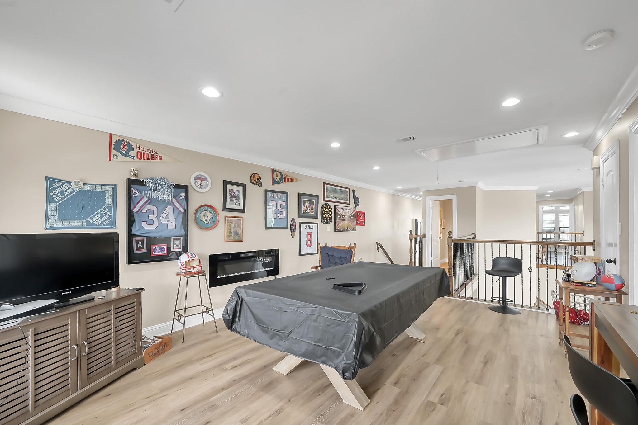 113 Capetown Way Montgomery, TX 77356 - Photo 31 of 39 a living room with fireplace furniture and a flat screen tv