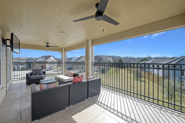 a view of a balcony with couch