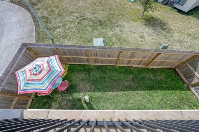 a view of swimming pool with a yard
