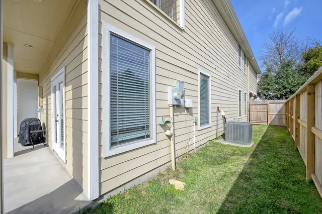 a house view with a backyard space