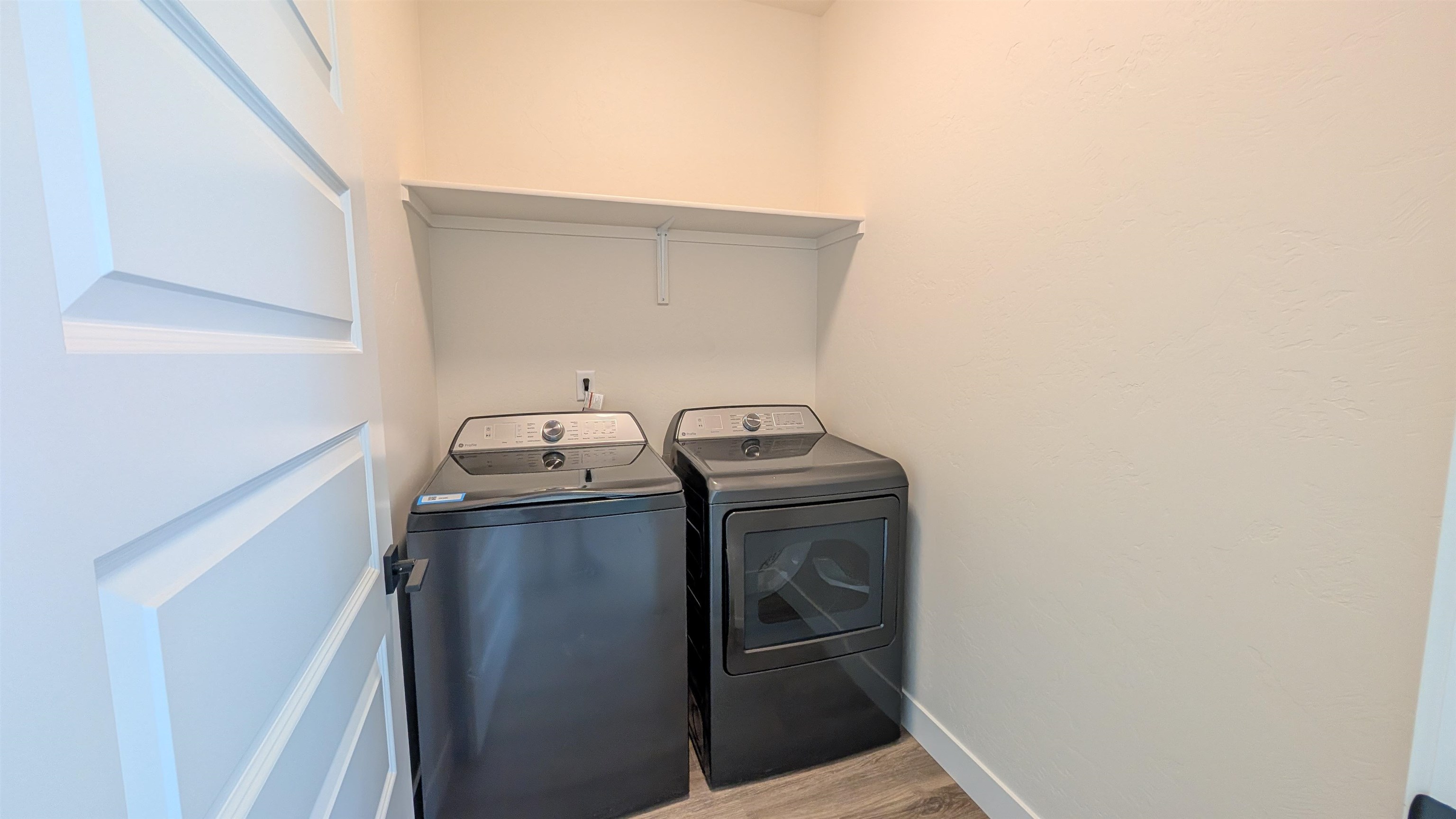 1660 Rusty Rivet Road Fruita, CO 81521 - Photo 13 of 15 a utility room with dryer and washer