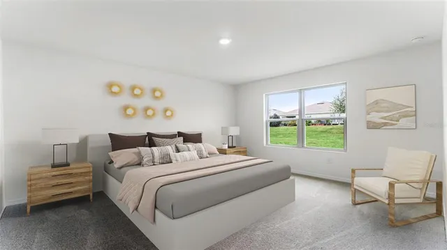 a bedroom with bed and a window