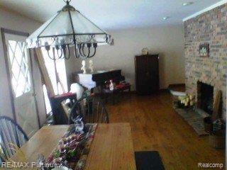 6136 Brophy Road Howell, MI 48855 - Photo 16 of 25 dining to living rm