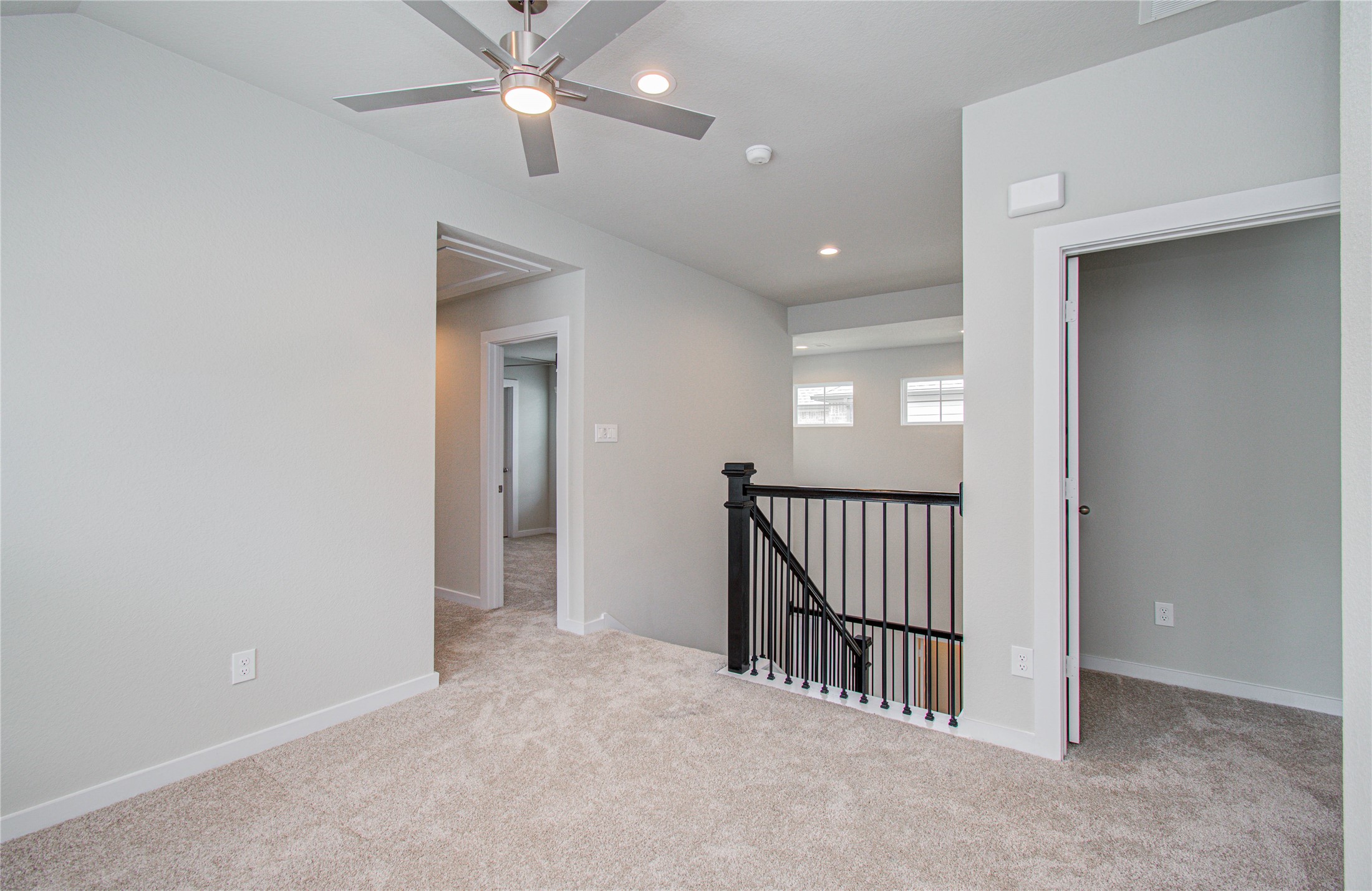 15723 Telge Ridge Lane Cypress, TX 77429 - Photo 21 of 31 wooden floor in a hall with a window