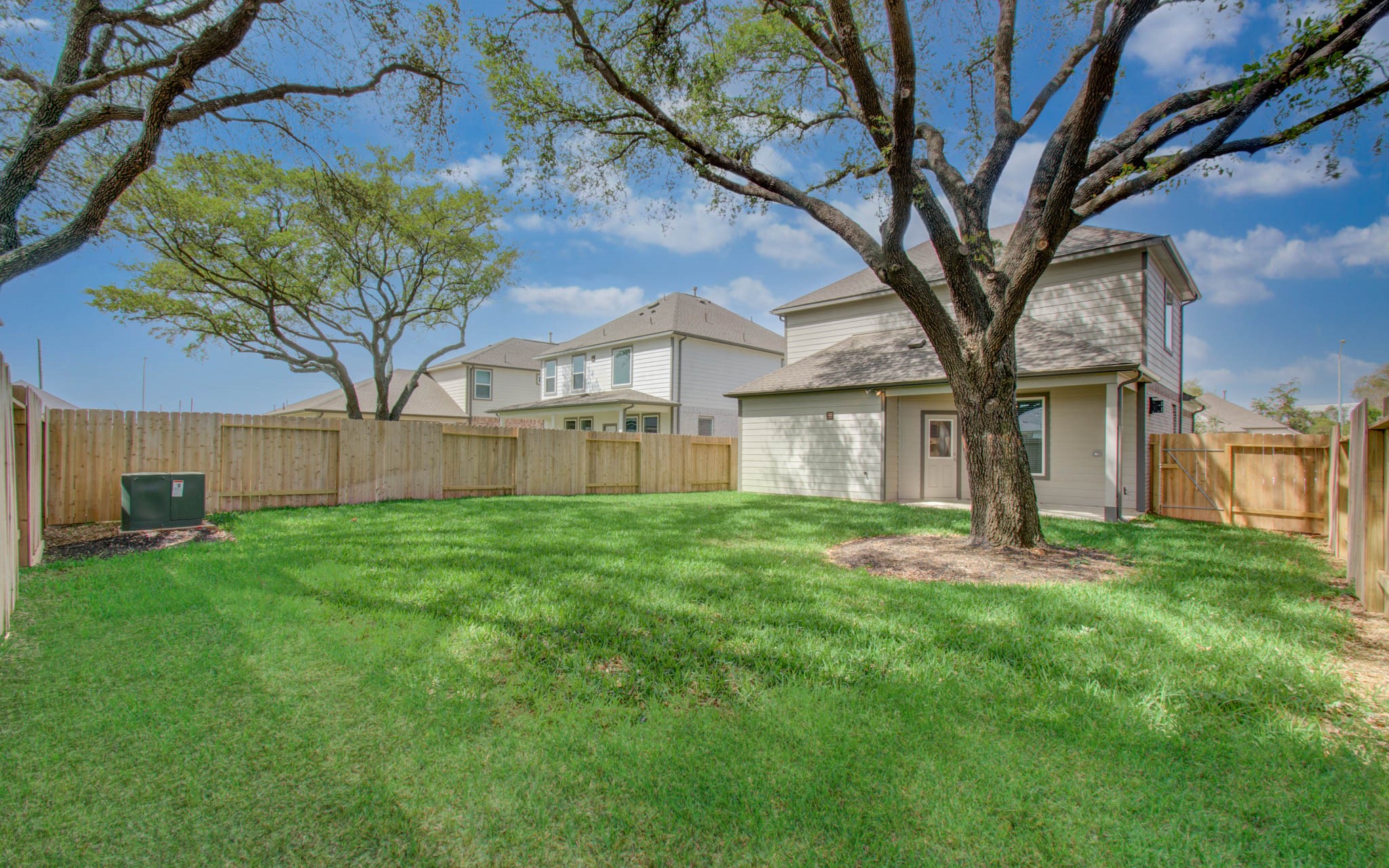 15723 Telge Ridge Lane Cypress, TX 77429 - Photo 29 of 31 a view of a yard in front of a house with large tree