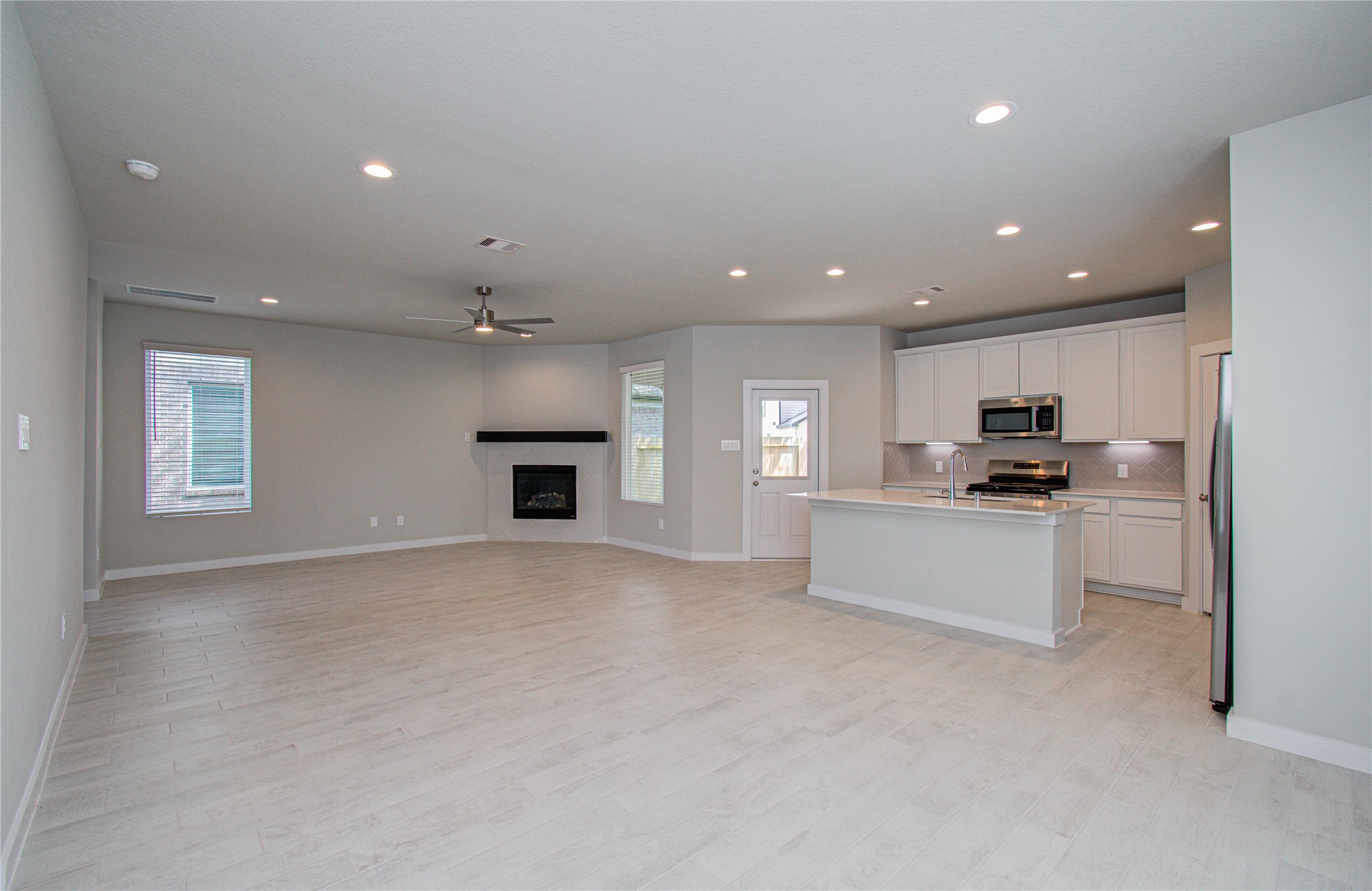 15723 Telge Ridge Lane Cypress, TX 77429 - Photo 4 of 31 a view of kitchen with refrigerator and window
