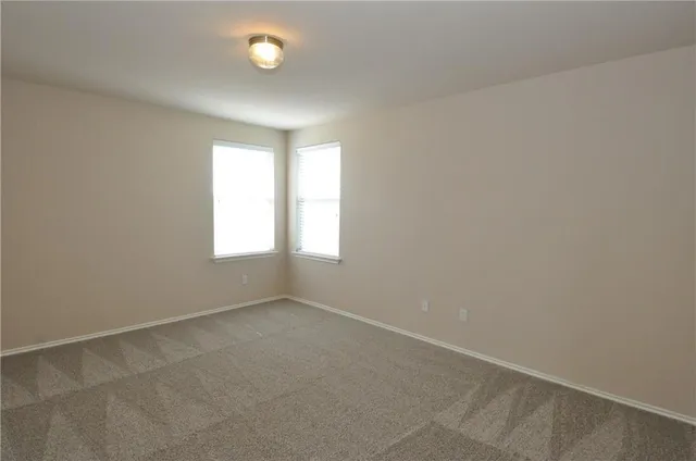 a bathroom with a bathtub and a sink