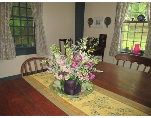 310 West Leyden Road Leyden, MA 01337 - Photo 10 of 22 a view of a dining room with furniture and a potted plant