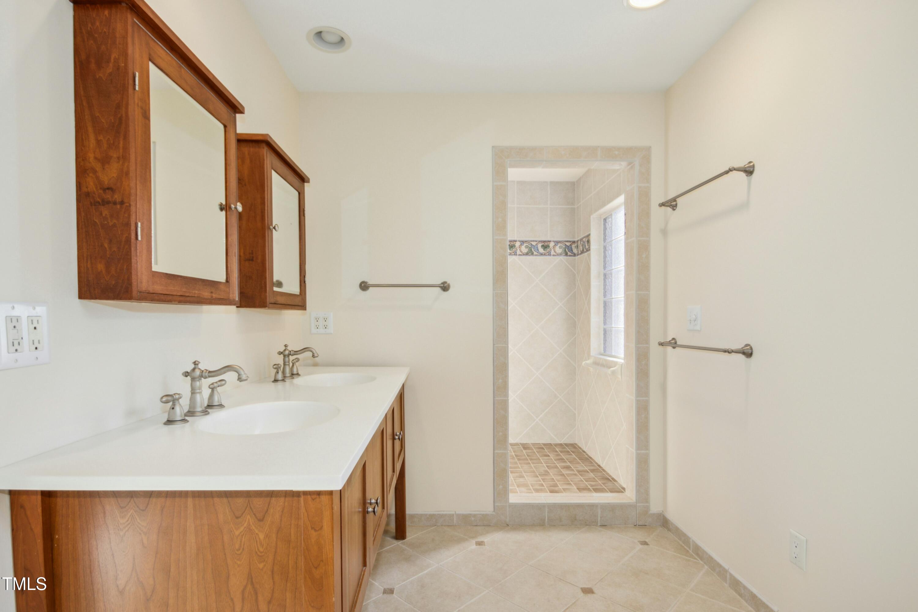 8808 Limestone Court Raleigh, NC 27615 - Photo 26 of 64 Ensuite Primary Bath