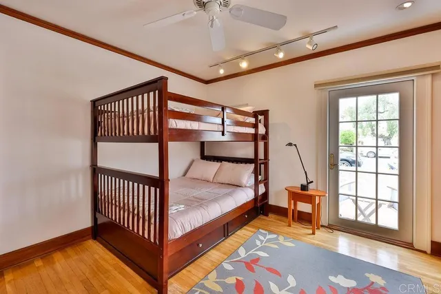 a bathroom with a sink toilet and mirror