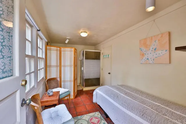 a view of a bathroom with a glass door