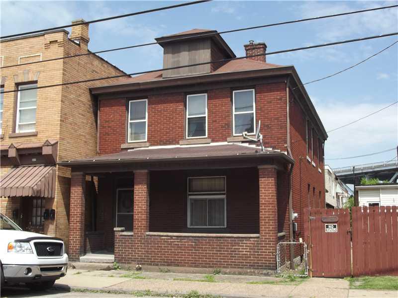 409 Ella Street McKees Rocks, PA 15136 - Photo 1 of 20 Exterior Front. Large, all brick exterior, fenced yard.