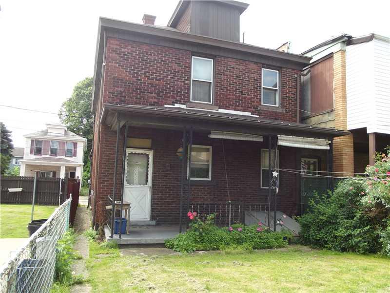 409 Ella Street McKees Rocks, PA 15136 - Photo 2 of 20 Exterior Back. Nice backyard with pretty plantings, back porch, and fenced in.