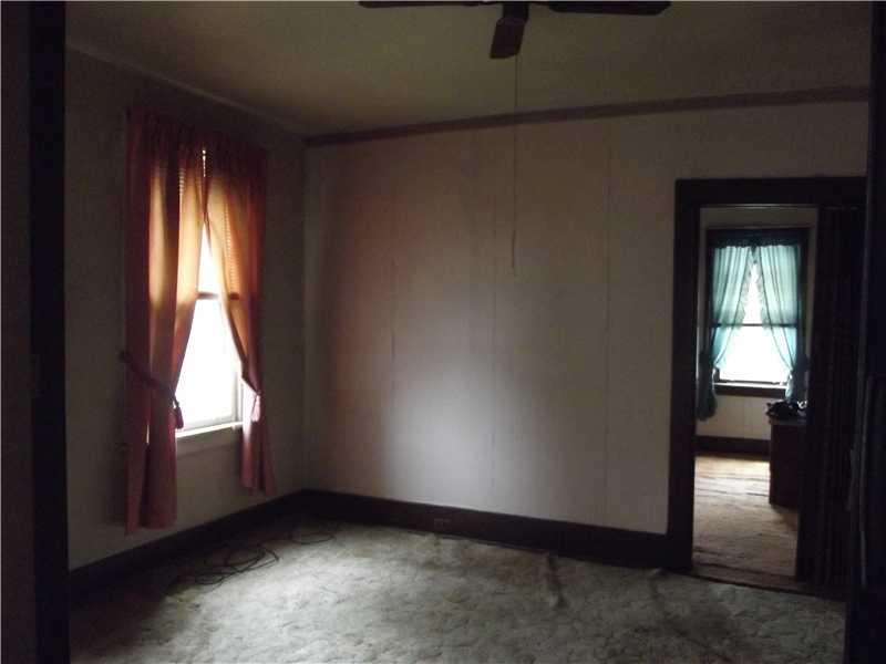 409 Ella Street McKees Rocks, PA 15136 - Photo 13 of 20 Master Bedroom. Master/largest bedroom is captive between upstairs kitchen and second bedroom. Hardwood under the carpet.