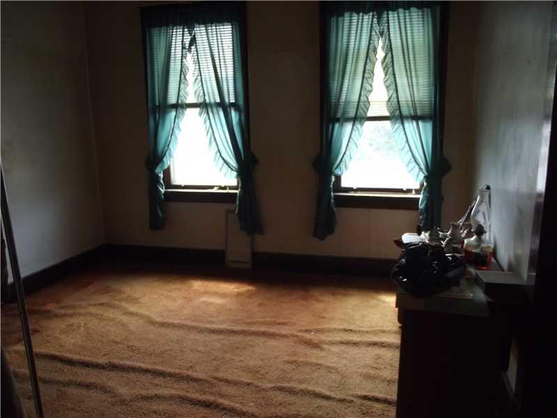 409 Ella Street McKees Rocks, PA 15136 - Photo 15 of 20 Bedroom. Second bedroom is also nice sized, and has two windows, and hardwood under the carpet.