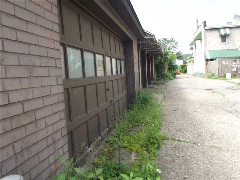 409 Ella Street McKees Rocks, PA 15136 - Photo 4 of 20 Parking Lot/Garage. Two car garage has opener, and is accessed by the back alley behind the house.