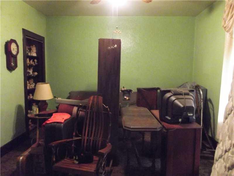 409 Ella Street McKees Rocks, PA 15136 - Photo 8 of 20 Living Room. Living room has built in shelving.