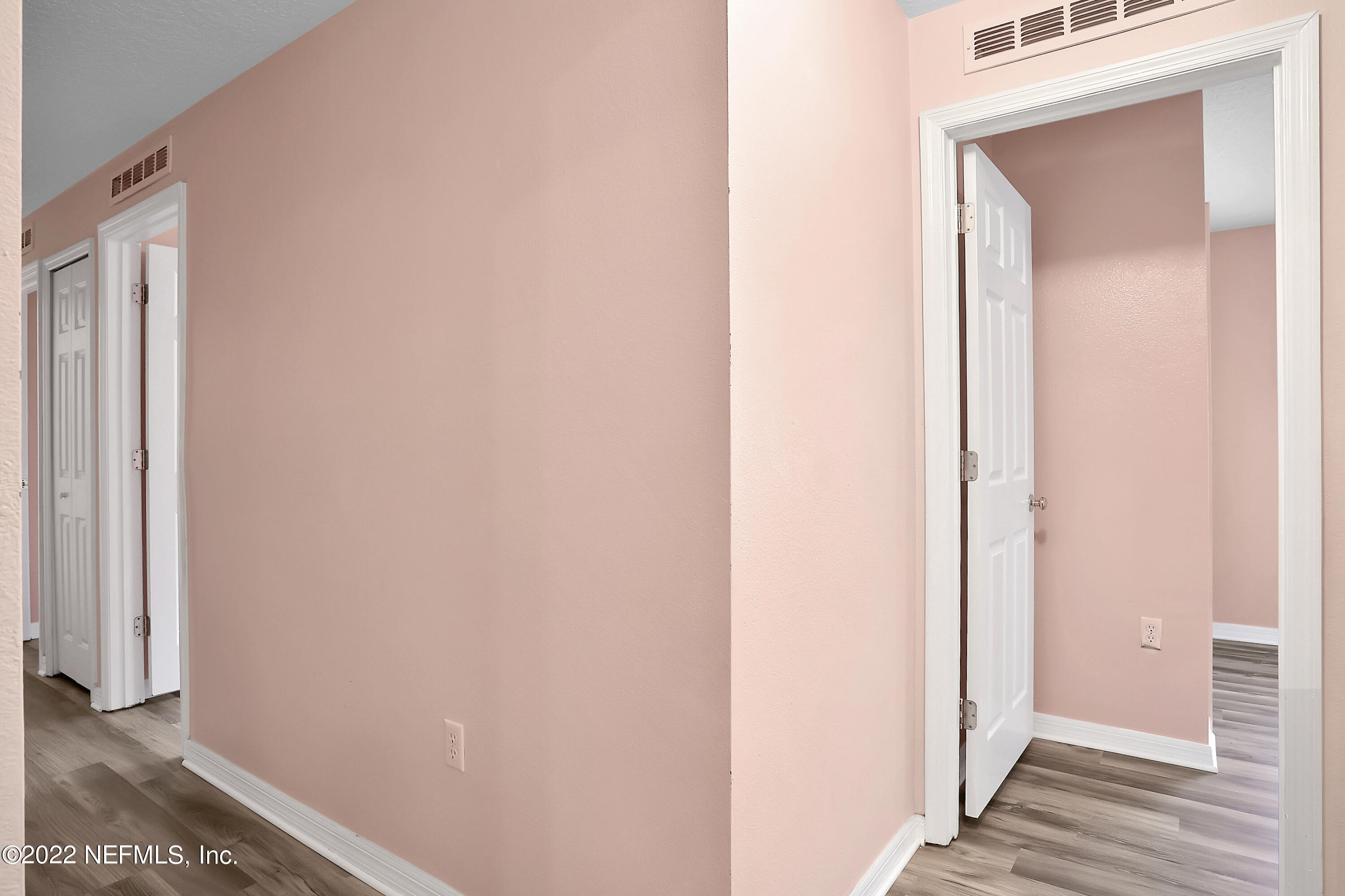 11 Wheatfield Drive Palm Coast, FL 32164 - Photo 24 of 36 a view of a hallway with wooden floor