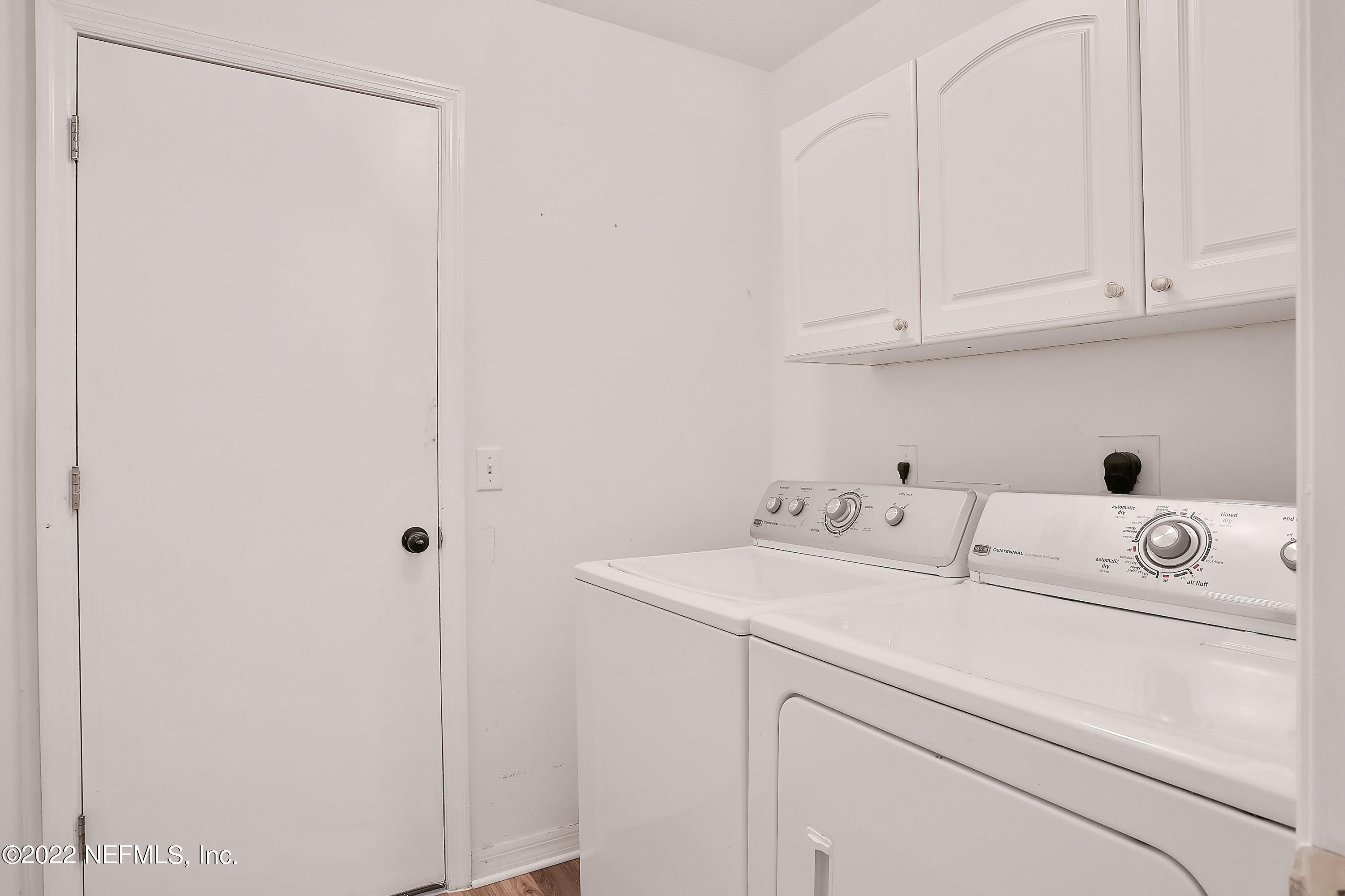 11 Wheatfield Drive Palm Coast, FL 32164 - Photo 26 of 36 a utility room with dryer and washer