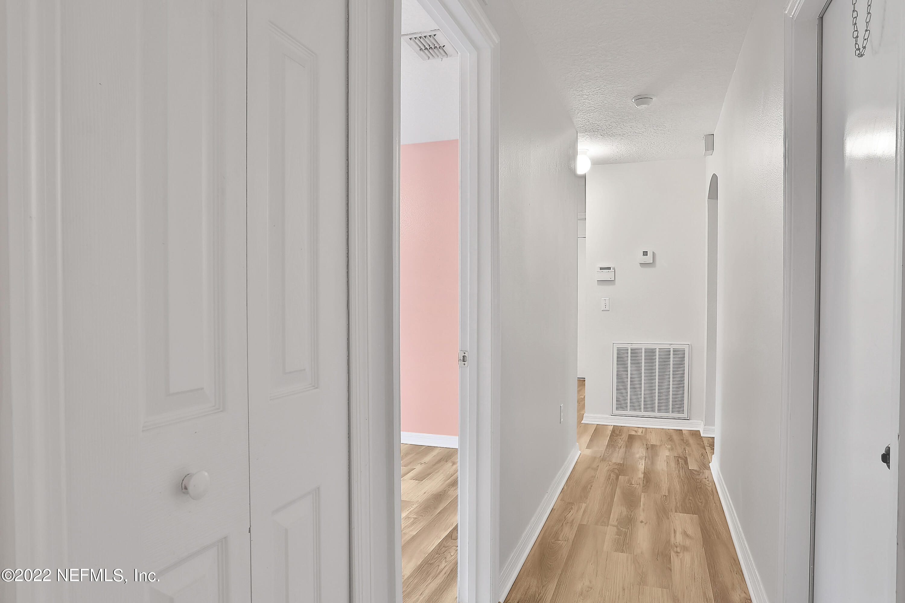 11 Wheatfield Drive Palm Coast, FL 32164 - Photo 30 of 36 a view of a bathroom from the hallway