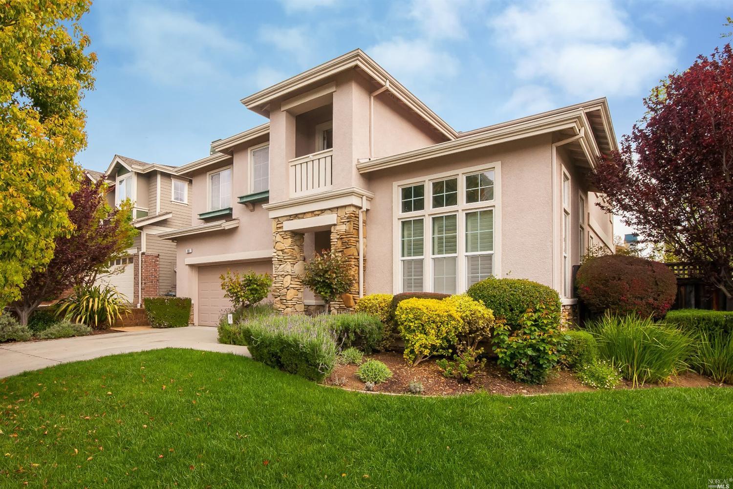 80 Pinheiro Circle Novato, CA 94945 - Photo 1 of 1 a front view of a house with a yard and trees
