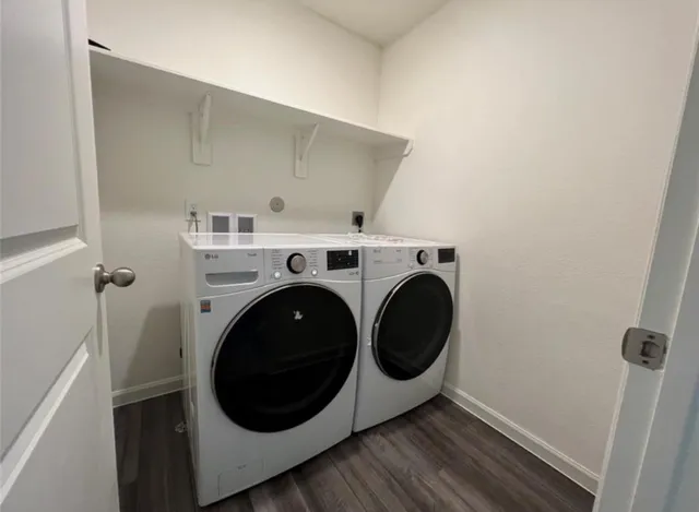 a utility room with dryer and washer