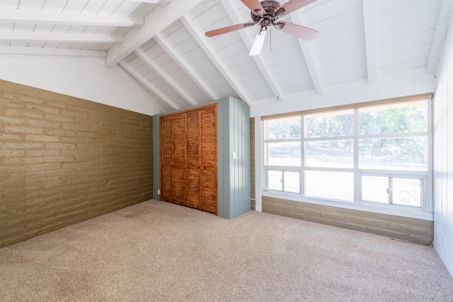 72 Los Laureles Grade Road Carmel Valley, CA 93924 - Photo 18 of 43 a view of an empty room with a window