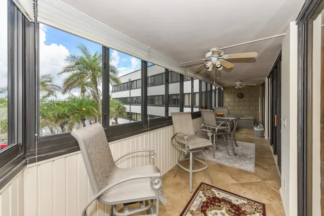 a view of a balcony with an ocean view