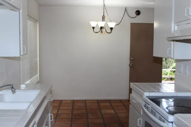 a view of a kitchen from the kitchen