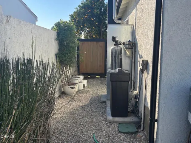 a view of a potted plants next to a yard