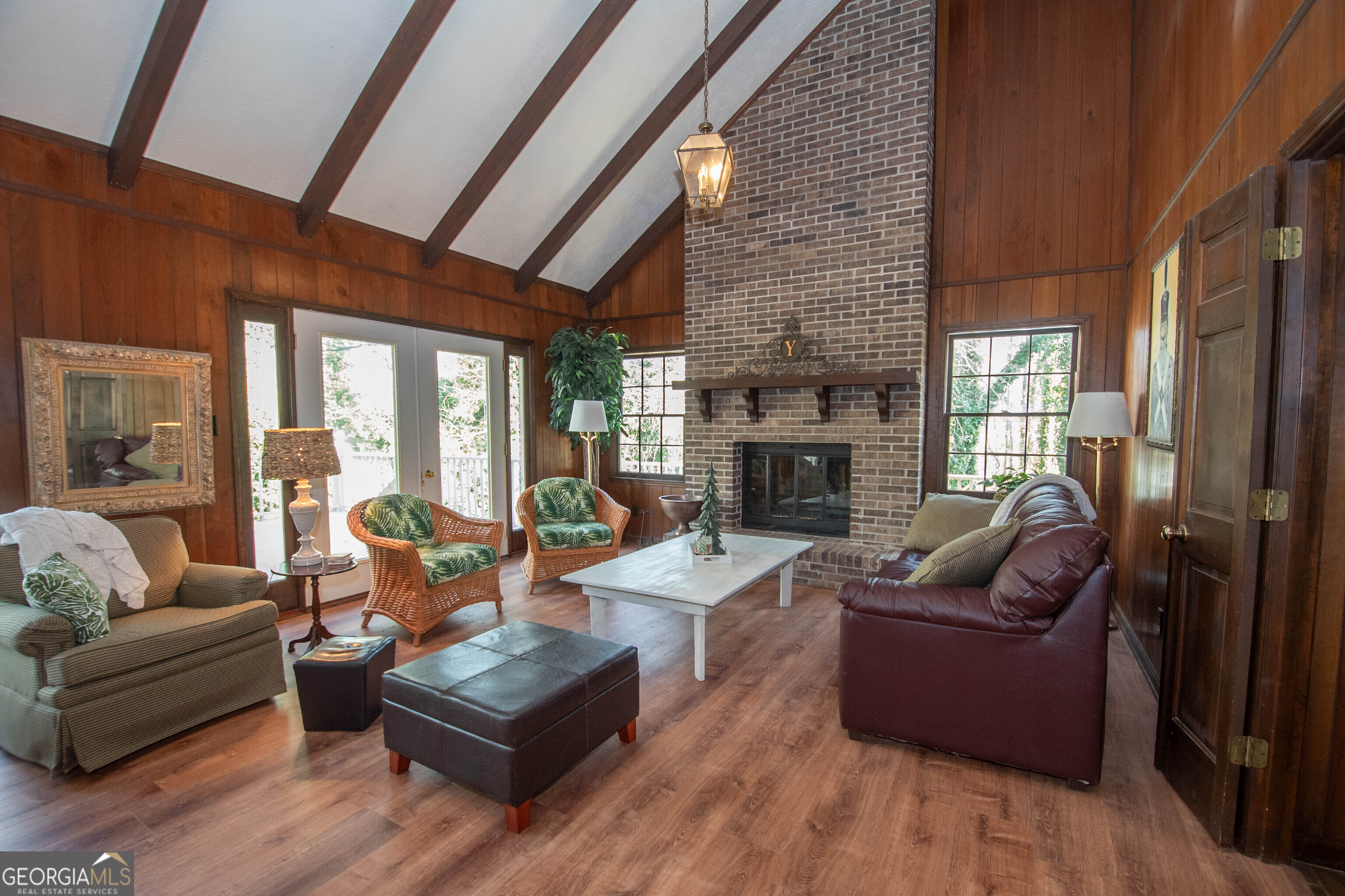 151 Evans Road Milner, GA 30257 - Photo 5 of 53 a living room with furniture and a fireplace