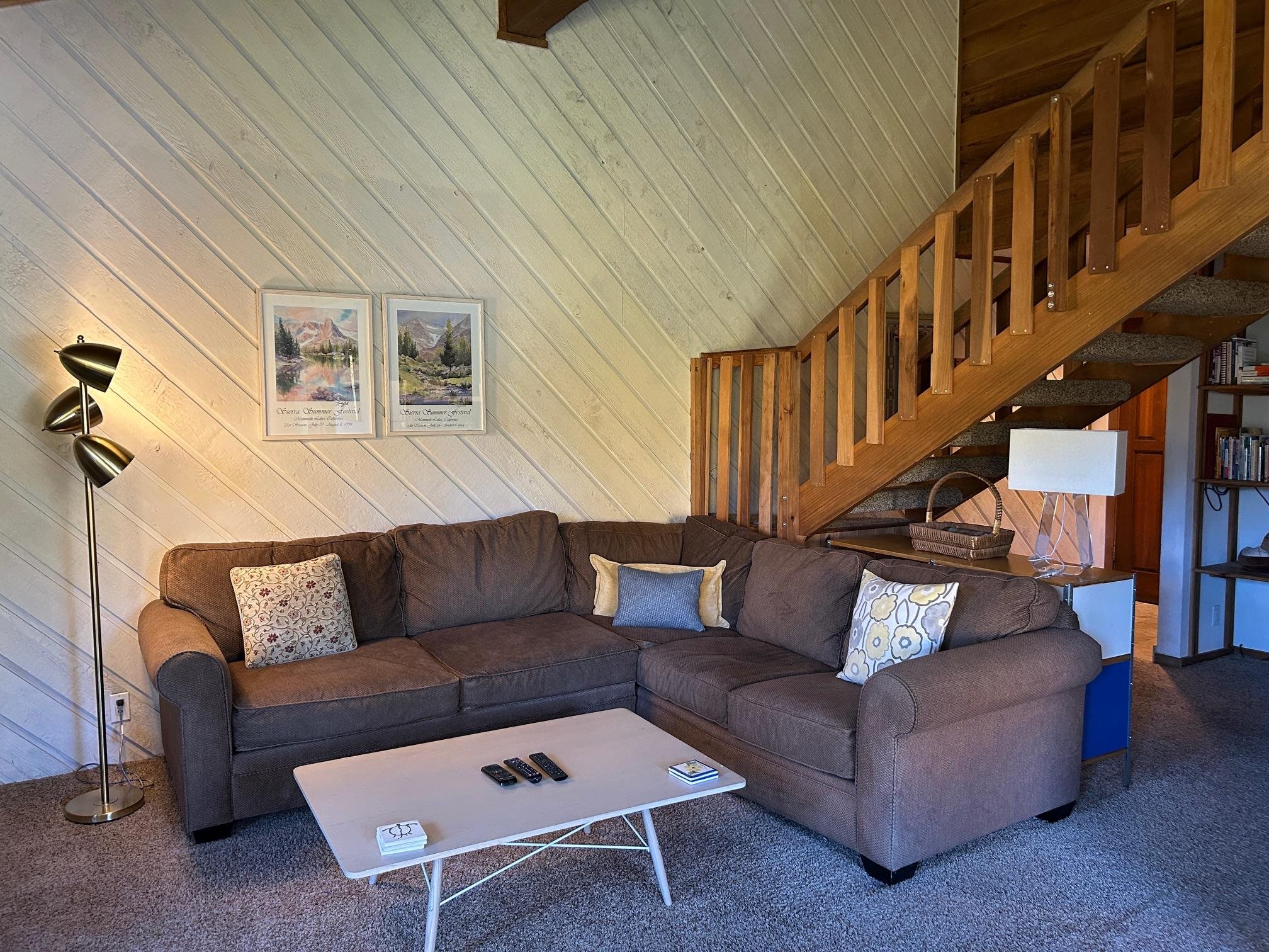 a living room with furniture and a couch