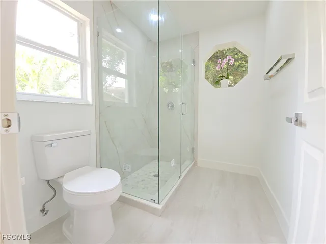 a view of kitchen with furniture and window