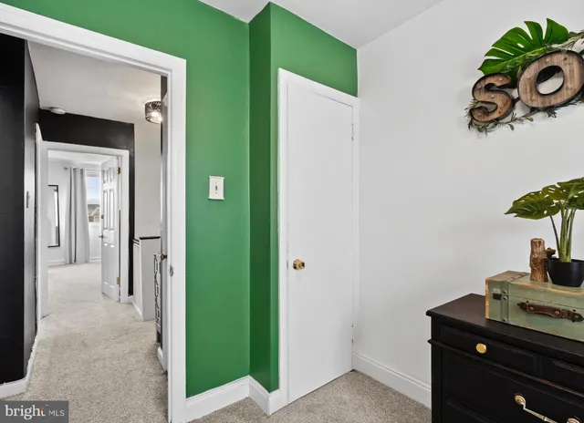 a view of a hallway with closet