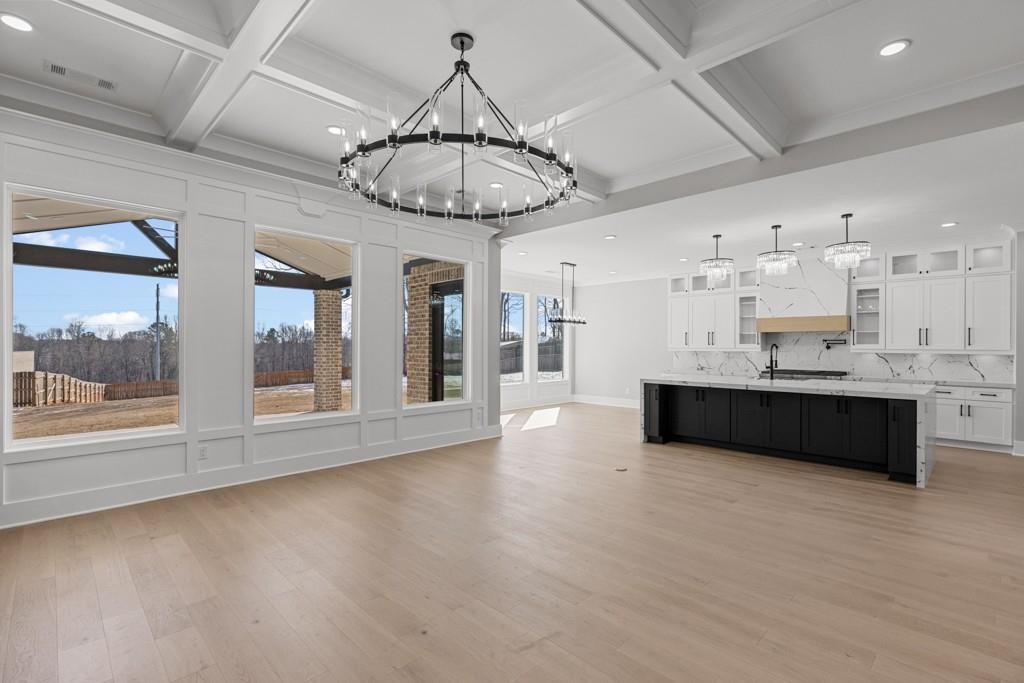 2739 South Waterworks Road Buford, GA 30518 - Photo 16 of 62 a view of a kitchen with a sink stainless steel appliances and cabinets