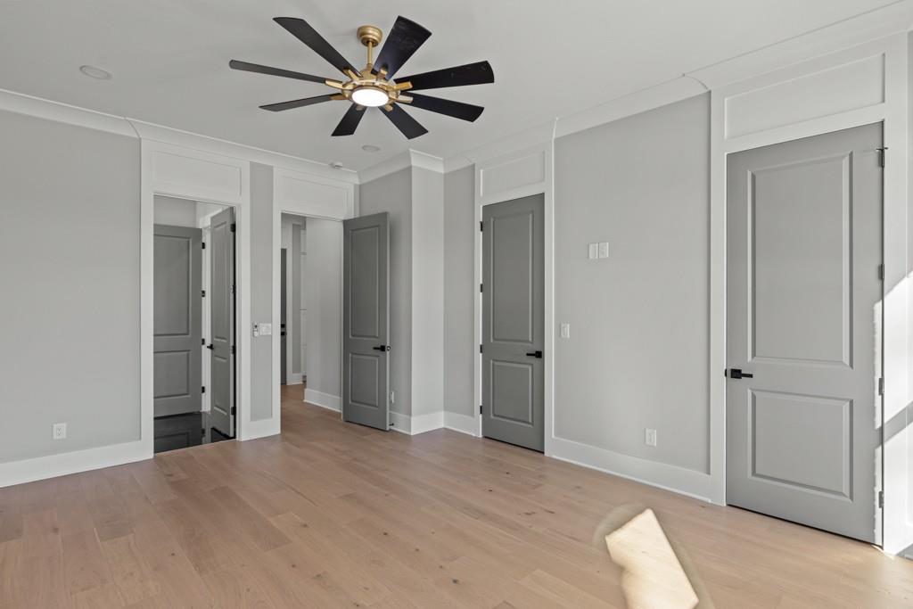 2739 South Waterworks Road Buford, GA 30518 - Photo 28 of 62 a view of livingroom with a ceiling fan and window