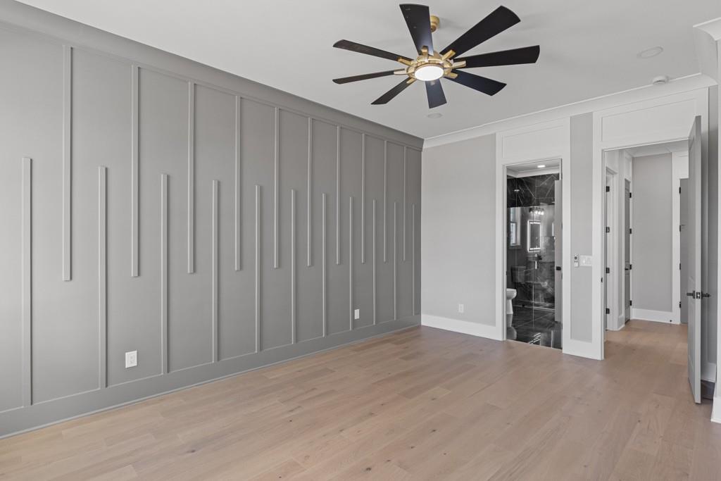 2739 South Waterworks Road Buford, GA 30518 - Photo 29 of 62 a view of an empty room with a ceiling fan
